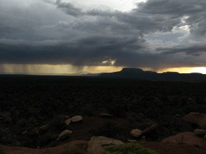 A western big sky with rain in the distance.