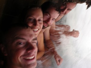 Under a waterfall at Fossil Creek.
